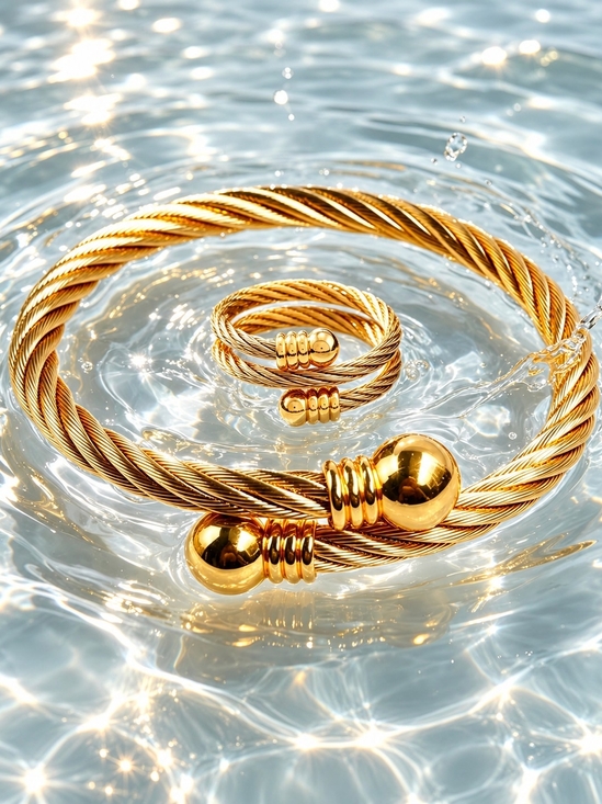 Anthropologie Jewelry - Gold Twisted Cable Cuff Bracelet and Ring Set